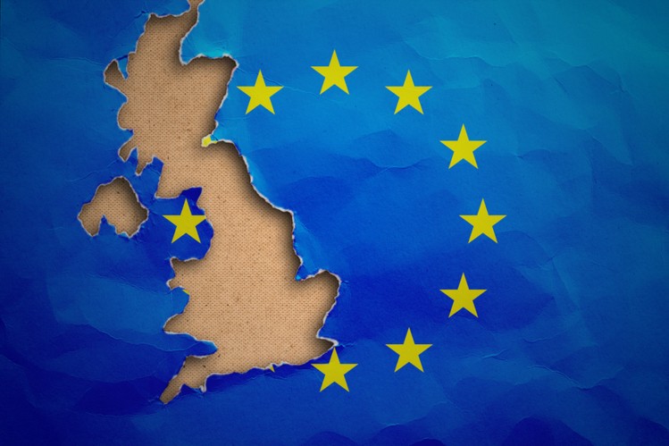 An EU flag with a UK shape cutout from it - representing Brexit.
